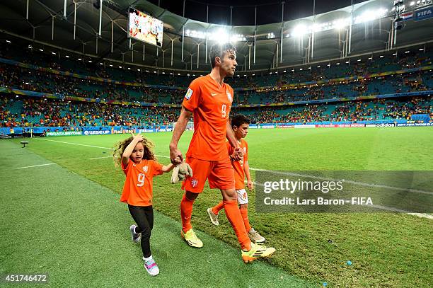 Robin van Persie of the Netherlands celebrates the win with his daughter Dina Layla and son Shaqueel after the 2014 FIFA World Cup Brazil Quarter...