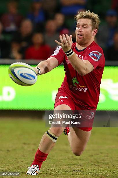 Ben Lucas of the Reds passes the ball during the round 18 Super Rugby match between the Western Force and the Queensland Reds at nib Stadium on July...