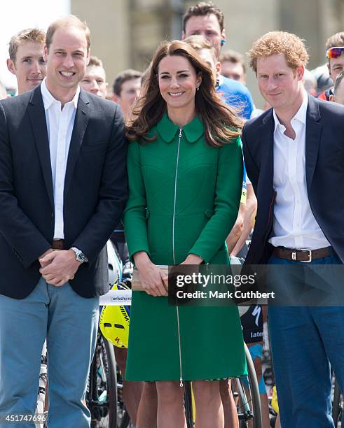 Prince William, Duke of Cambridge and Catherine, Duchess of Cambridge with Prince Harry attend the Grand Depart of The Tour de France at Harewood...