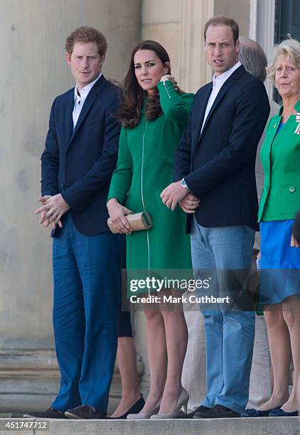 Prince William, Duke of Cambridge and Catherine, Duchess of Cambridge with Prince Harry attend the Grand Depart of The Tour de France at Harewood...