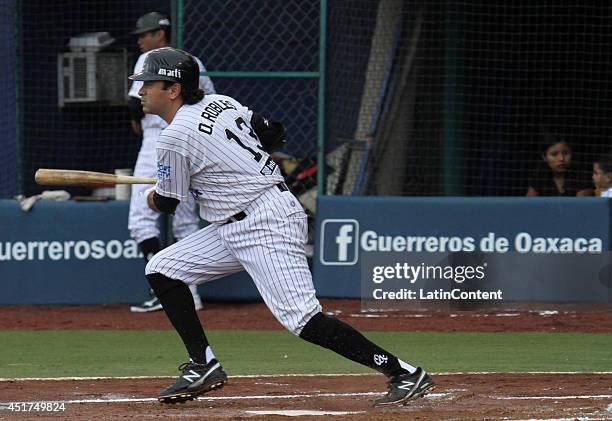 Oscar Robles of Guerreros runs to first base after hitting the ball during a match between Saraperos de Saltillo and Guerreros de Oaxaca as part of...