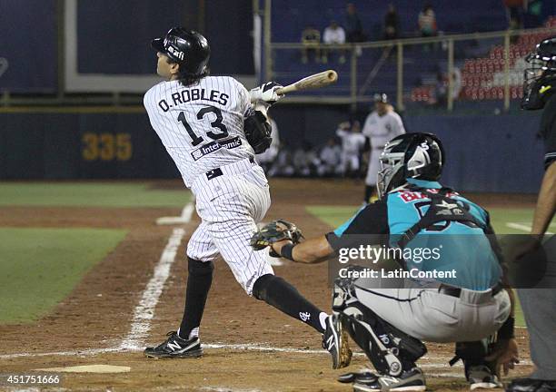 Oscar Robles bats the ball during a match between Saraperos de Saltillo and Guerreros de Oaxaca as part of the Mexican Baseball League 2014 at...