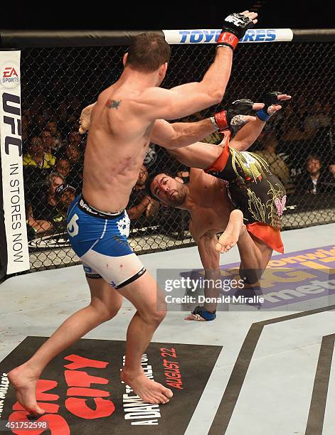 Lyoto Machida kicks UFC middleweight champion Chris Weidman in their UFC middleweight championship fight at UFC 175 inside the Mandalay Bay Events...