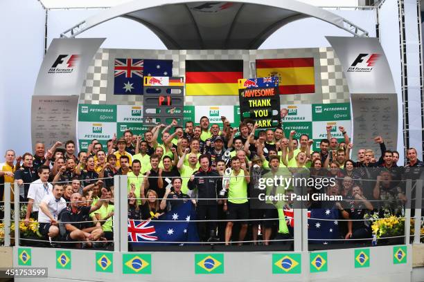 Race winner Sebastian Vettel of Germany and Infiniti Red Bull Racing, second placed team mate Mark Webber of Australia and Infiniti Red Bull Racing,...