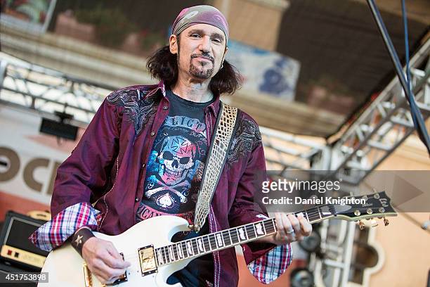 Musician Bruce Kulick of Grand Funk Railroad performs on stage at the San Diego County Fair on July 5, 2014 in Del Mar, California.