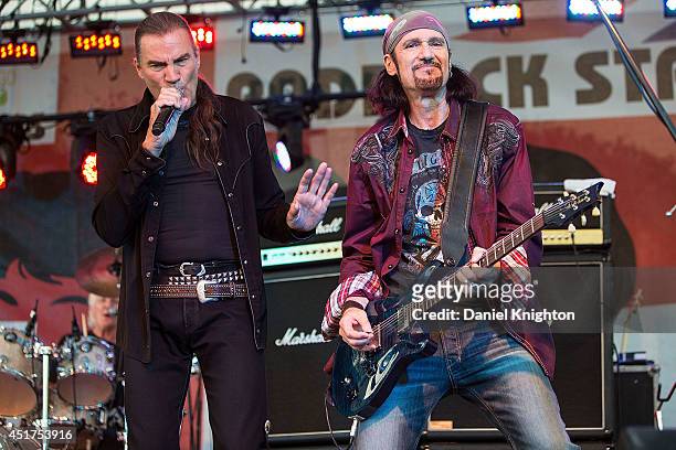Musicians Max Carl and Bruce Kulick of Grand Funk Railroad perform on stage at the San Diego County Fair on July 5, 2014 in Del Mar, California.