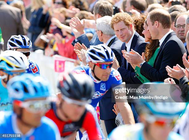 Prince Harry, Catherine, Duchess of Cambridge and Prince William, Duke of Cambridge watch the Tour de France Grand Depart at Harewood House on July...