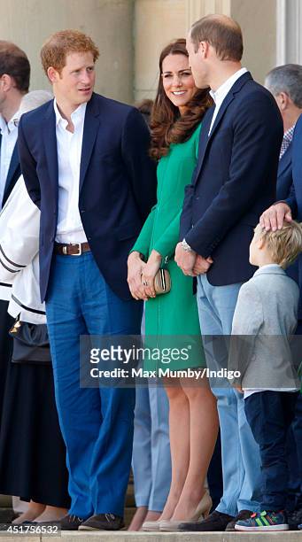 Prince Harry, Catherine, Duchess of Cambridge and Prince William, Duke of Cambridge attend the Tour de France Grand Depart at Harewood House on July...