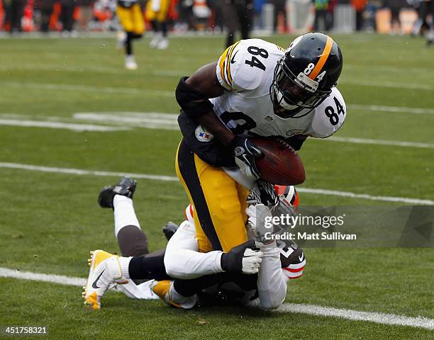 Wide receiver Antonio Brown of the Pittsburgh Steelers catches a touchdown pass as his is hit by defensive back Joe Haden of the Cleveland Browns at...