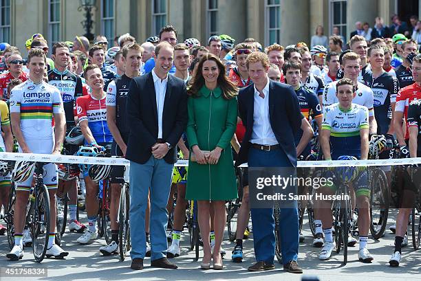 Catherine, Duchess of Cambridge, Prince William, Duke of Cambridge and Prince Harry attend the official start of the Tour de France at Harewood House...