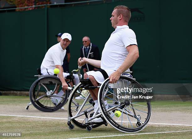 Maikel Scheffers and Ronald Vink of Netherlands during their Gentlemen's Wheelchair Doubles Final match against Stephane Houdet of France and Shingo...