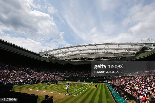 General view of centre court as Roger Federer of Switzerland makes a return during the Gentlemen's Singles Final match against Novak Djokovic of...