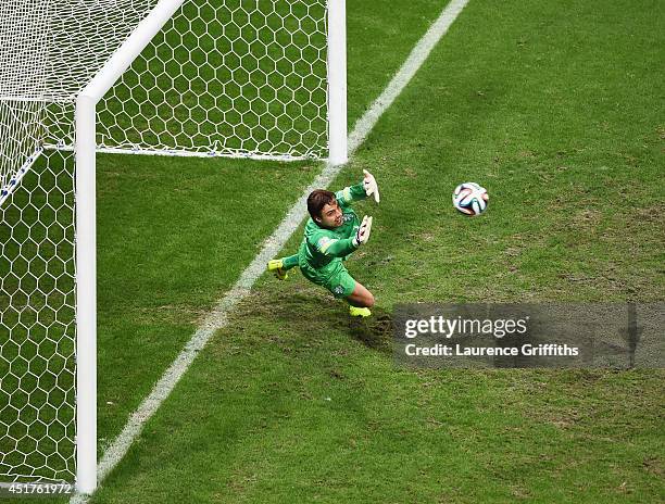 Goalkeeper Tim Krul of the Netherlands fails to save a penalty from Christian Bolanos of Costa Rica in the shoot out during the 2014 FIFA World Cup...