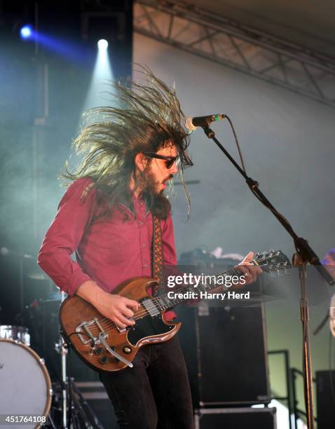 Marcus Bonfanti performs on stage at Cornbury Music Festival at Great Tew Estate on July 6, 2014 in Oxford, United Kingdom.