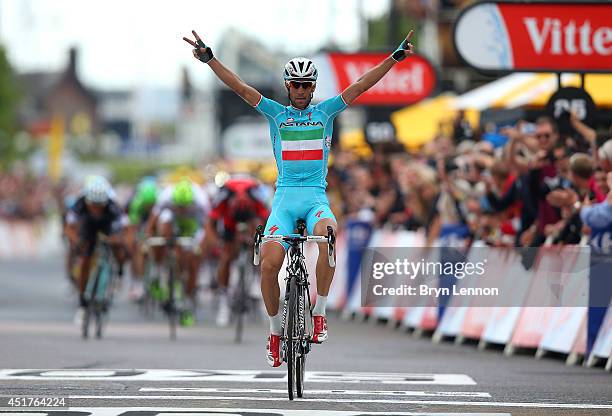 Vincenzo Nibali of Italy and ProTeam Astana crosses the line to win the second stage of the 2014 Tour de France, a 201km stage between York and...