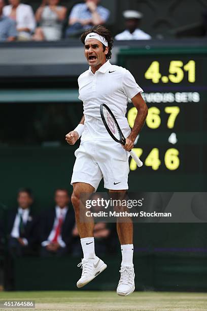 Roger Federer of Switzerland celebrates during the Gentlemen's Singles Final match against Novak Djokovic of Serbia on day thirteen of the Wimbledon...