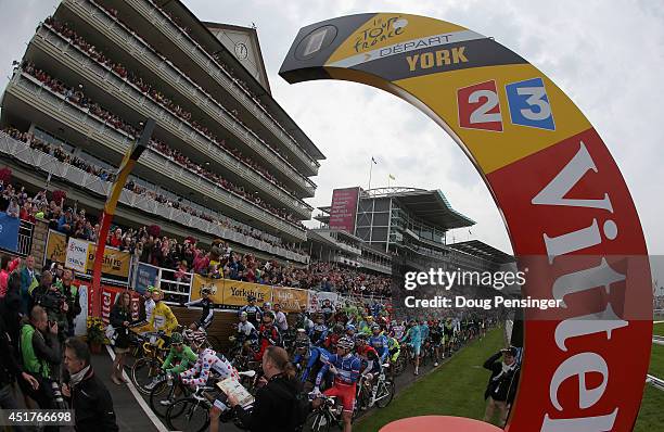 Riders prepare to leave the start of stage two of the 2014 Le Tour de France from York to Sheffield on July 6, 2014 in York, United Kingdom.