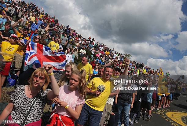 Fans crowd the sides of the course as they support the riders during stage two of the 2014 Le Tour de France from York to Sheffield on July 6, 2014...
