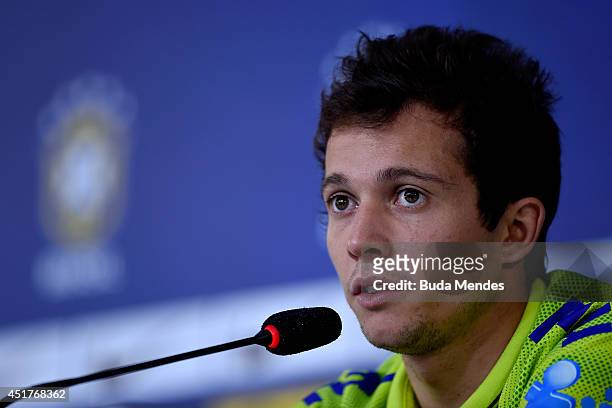 Bernard speaks during a press conference of the Brazilian national football team at the squad's Granja Comary training complex, on July 06, 2014 in...