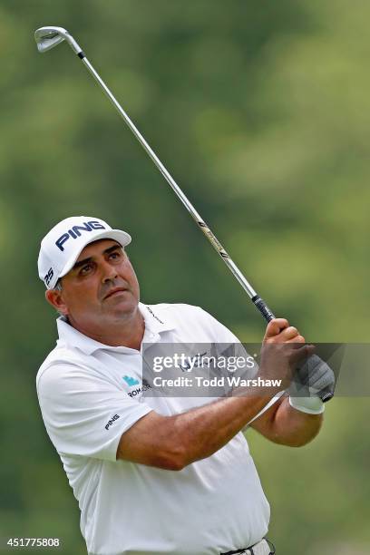 Angel Cabrera of Argentina tees off on the second hole during the final round of the Greenbrier Classic at the Old White TPC on July 6, 2014 in White...