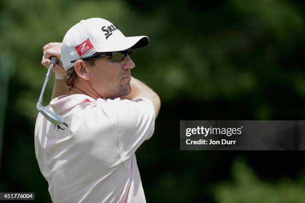 George McNeill tees off on the third hole during the final round of the Greenbrier Classic at the Old White TPC on July 6, 2014 in White Sulphur...