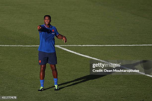 Patrick Kluivert, Netherlands assistant coach signals to a player during the Netherlands training session at the 2014 FIFA World Cup Brazil held at...