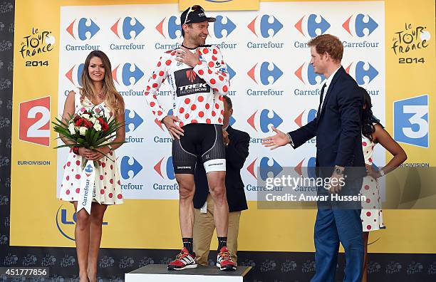 Prince Harry present Jens Voigt with the King of the Mountains jersey at the end of of Stage 1 of the Tour de France, on July 05, 2014 in Harrogate,...