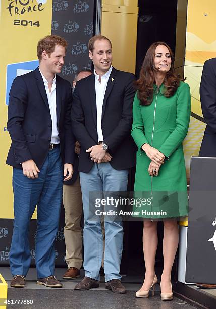 Prince Harry, Prince William, Duke of Cambridge and Catherine, Duchess of Cambridge stand on the podium at the end of of Stage 1 of the Tour de...