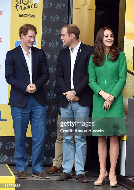 Prince Harry, Prince William, Duke of Cambridge and Catherine, Duchess of Cambridge stand on the podium at the end of of Stage 1 of the Tour de...