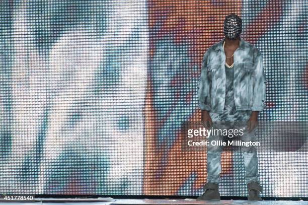 Kanye West performs headlining on stage at the Wireless Festival Birmingham at Perry Park on July 6, 2014 in Birmingham, United Kingdom.