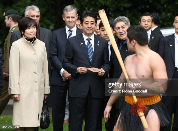 Japanese Prime Minister Shinzo Abe is given a traditional Maori welcome at Government House on July 7, 2014 in Auckland, New Zealand. Prime Minister...