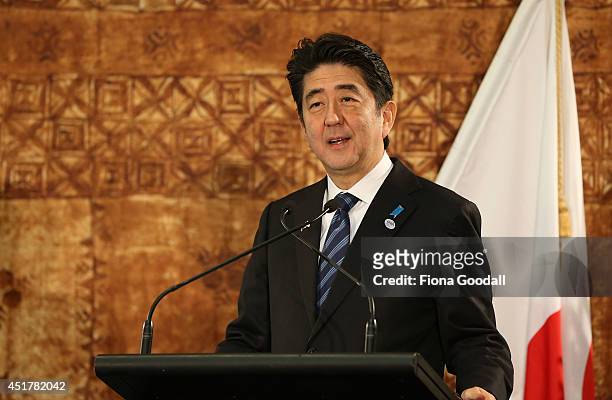 Japanese Prime Minister Shinzo Abe speaks to the media after a traditional Maori welcome at Government House and talks with New Zeland Prime Minister...