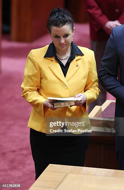 Senator for Tasmania Jacqui Lambie is sworn in during an official ceremony on July 7, 2014 in Canberra, Australia. Twelve Senators will be sworn in...