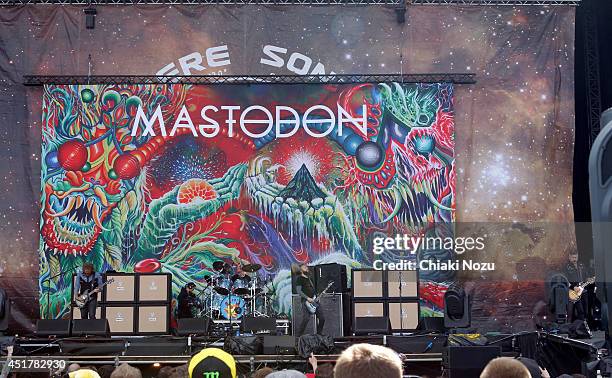 Brent Hinds, Troy Sanders and Bill Kelliher of Mastodon performs at Day 3 of the Sonisphere Festival at Knebworth Park on July 6, 2014 in Knebworth,...