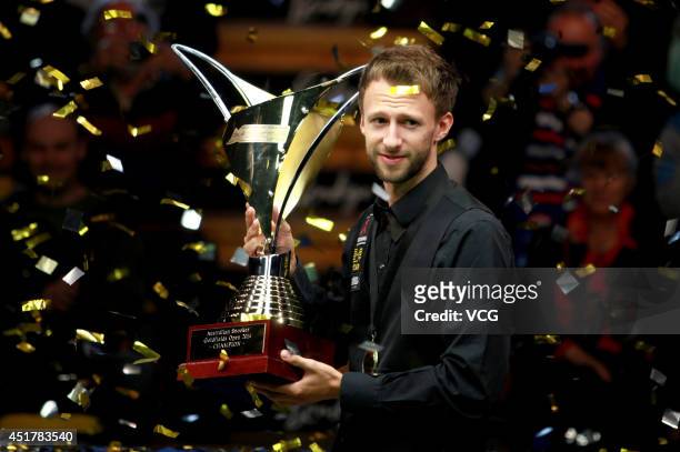 Judd Trump of England poses with his trophy after the match against Neil Robertson of Australia on day seven of the World Snooker Australia Open at...