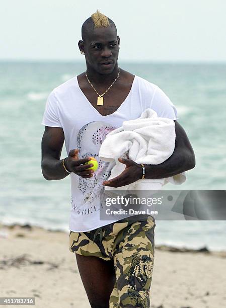 Mario Balotelli is seen on the beach in Miami Beach on July 6, 2014 in Miami, Florida.