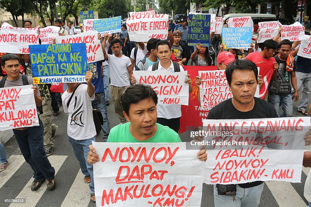 Workers led by National Labor Center, Kilusang Mayo Uno held...