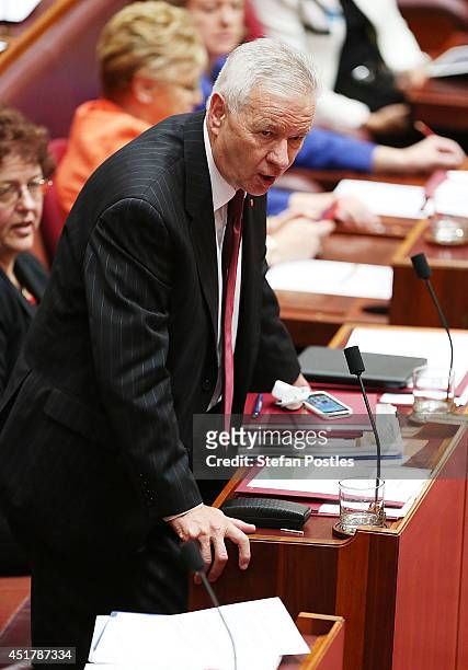 Senator Doug Cameron during Senate question time on July 7, 2014 in Canberra, Australia. Twelve Senators will be sworn in today, with the repeal of...