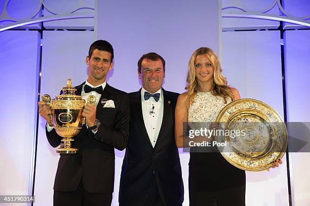 Chairman of the All England Lawn Tennis Club Philip Brook poses with Novak Djokovic of Serbia posing with the Gentlemen's Singles Trophy and Petra...