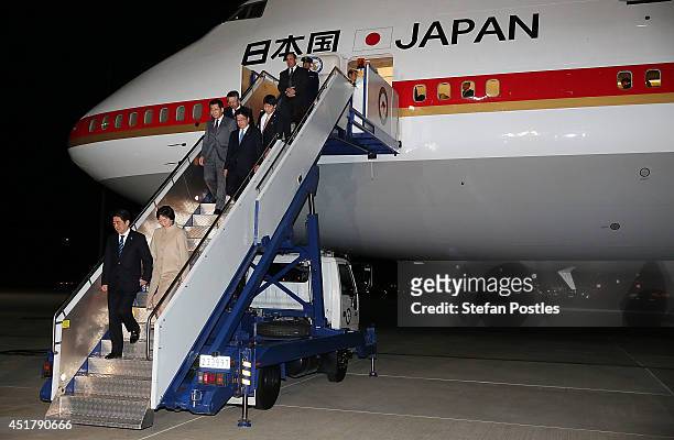 Japanese Prime Minister Shinzo Abe and his wife Akie Abe arrive at Fairburn Airbase on July 7, 2014 in Canberra, Australia. Prime Minister Abe is in...