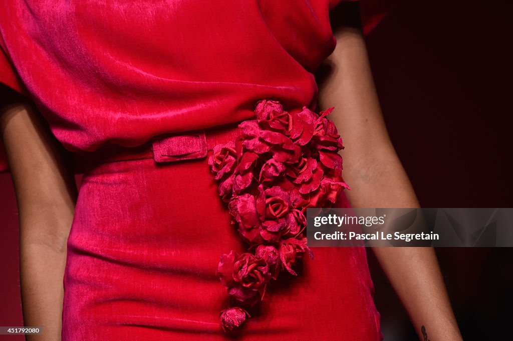 A dress detail is seen as a model walks the runway during the... News ...