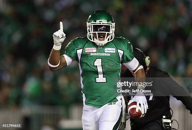 Runningback Kory Sheets of the Saskatchewan Roughriders celebrates a touchdown against the Hamilton Tiger-Cats in the second quarter during the 101st...