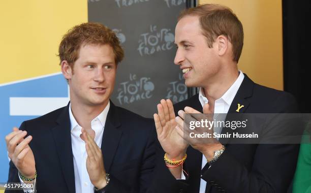 Prince Harry and Prince William, Duke of Cambridge attend the finish of Stage 1 of the Tour de France on July 5, 2014 at Harrogate, Yorkshire,...