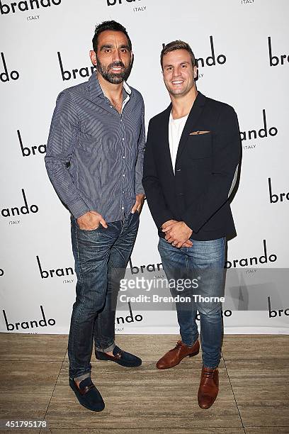 Adam Goodes and Beau Ryan arrive at the official Brando Shoes Exhibition at The Ivy on July 7, 2014 in Sydney, Australia.
