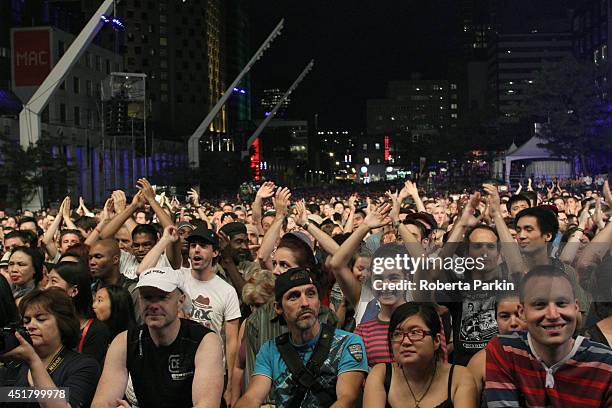 Crowd at Deltron 3030 performs during the 2014 Festival International de Jazz de Montreal on July 6, 2014 in Montreal, Canada.