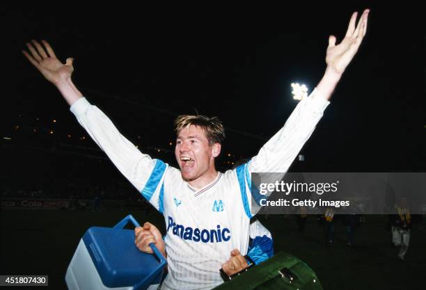 Marseille player Chris Waddle celebrates after Marseille beat AC Milan with a goal by Waddle, to win the UEFA European Cup quarter final second leg...