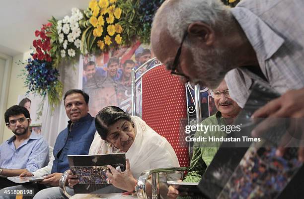 Shivsena leader Aditya Thackray, Ashish Shelar, Veteran singer Lata Mangeshkar and former cricketer Ajit Wadekar during the launch of book, Champion...