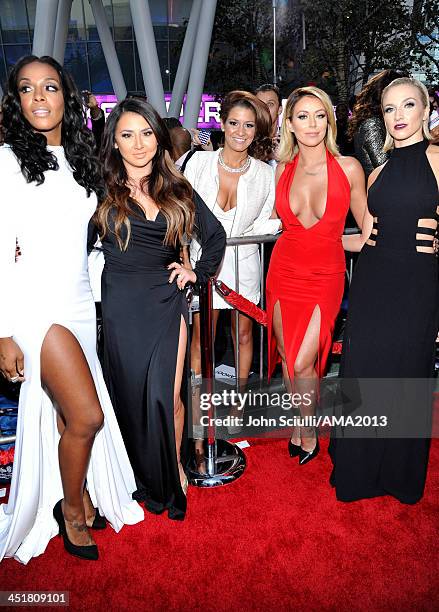 Recording artists Dawn Richards, Andrea Fimbres, Aubrey O'Day and Shannon Bex of Danity Kane pose in the Music Choice Lounge at the 2013 American...