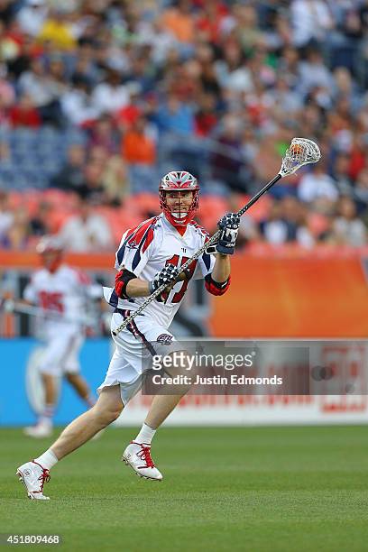 Brodie Merrill of the Boston Cannons in action against the Denver Outlaws at Sports Authority Field at Mile High on July 4, 2014 in Denver, Colorado....