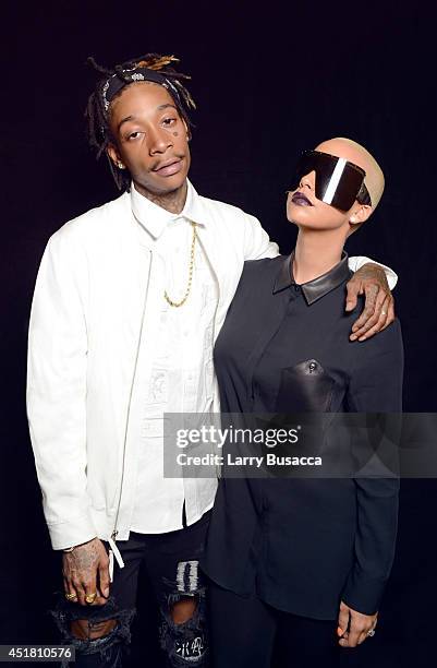 Amber Rose and Wiz Khalifa pose for a portrait at the 2014 Billboard Music Awards on May 18, 2014 in Las Vegas, Nevada.